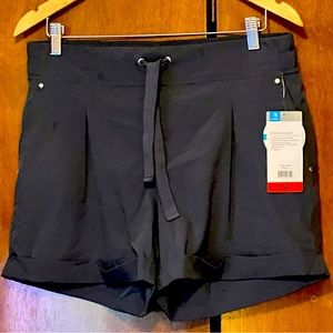 NWT MPG stretch shorts. Size M Black/Gray never worn. Perfect condition.
